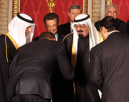Obama bows in submission